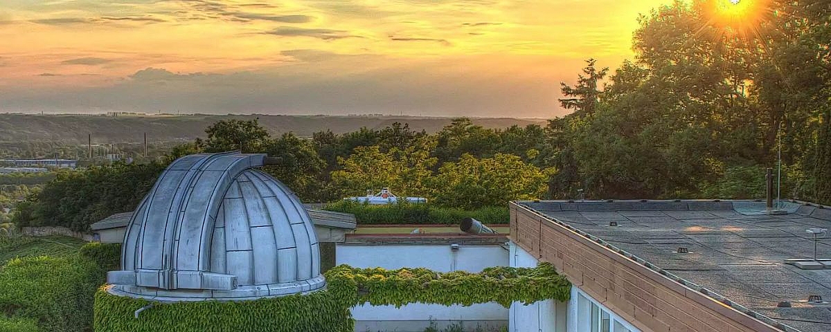 Schloss Wackerbarth Sunset over the vineyards with a view of the Elbe valley, with the Radebeul observatory above the vineyards in harmony with nature.